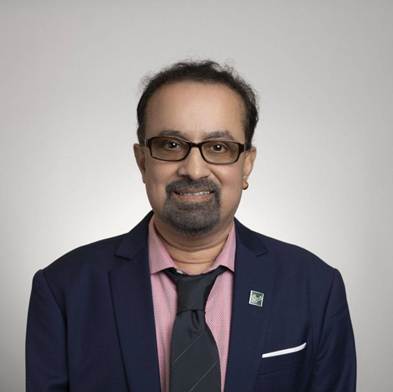 May be an image of 1 person, smiling and glasses
